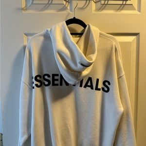 Ivory white Essential back logo hoodie, one of the first ever drops. Got stained